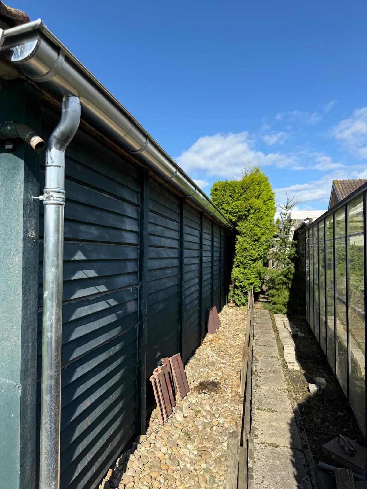 Zinken dakgoot en regenpijp Wognum