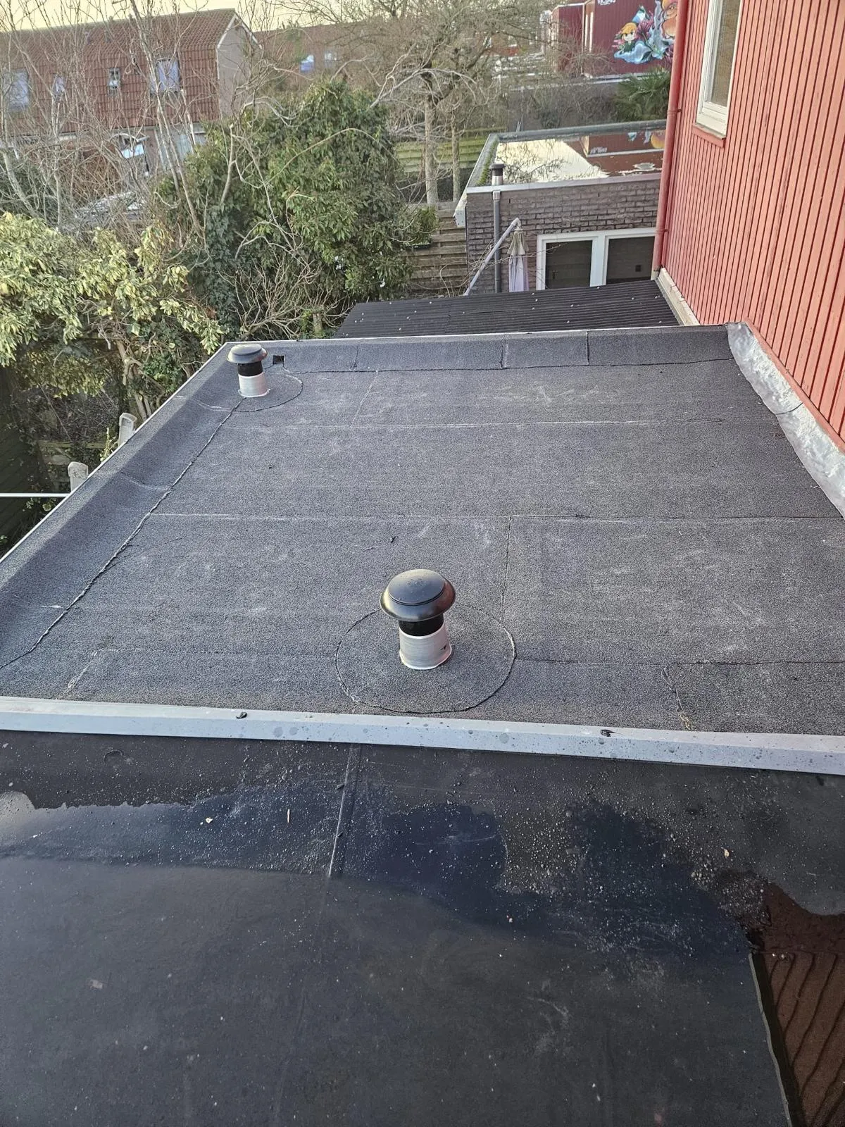 Platdak renovatie Purmerend